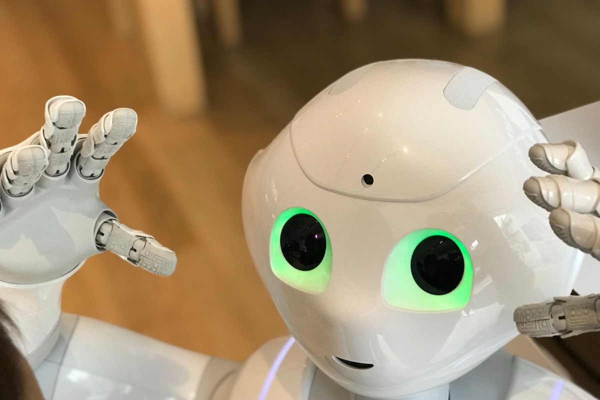 A friendly humanoid robot representing AI agents